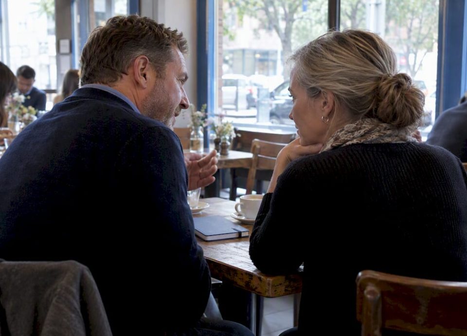 Owner discussing a confidential sale over lunch