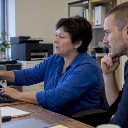 Owner demonstrating a process to a successor