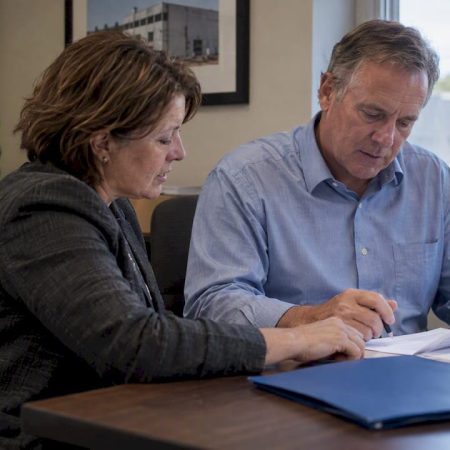 Seller and landlord reviewing lease release terms